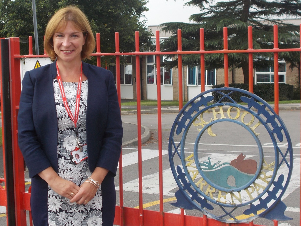 Mrs Cooper Mrs cooper by School gates